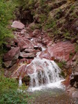 Also in the mountains we saw a lot of this very red rock, including riverbeds, cliffs etc, a very impressive sight!!  This photo makes the rock look quite brown, in real life they were much redder than that.