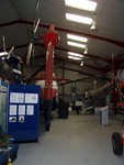 A general shot of the display hall: rear-end of a Wessex at left, Westland Dragonfly at right, and in the centre background, the rotor head of the ill-fated Fairey Rotodyne.