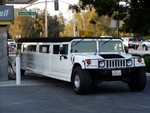 Stretch Hummer 2
Same stretched hummer just from a different angle. We watched this hummer leave the gas station it had to do a three point turn to make a right turn onto the road.