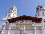 This pic looks up at the front of the main house, 'La Casa Grande'. The facade is all marble and very,very big... The carved frieze across the front entrance is the height of the ballroom ceiling inside, at a guess, about 30 feet high.