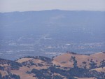 This picture was taken looking back towards San Jose from the Lick Observatory. Our camera was on maximum to take this one. This is a small shot of San Jose. In about the middle of the photo there is what looks to be a road. This road is in fact the 101-Highway at this point it is about 12 lanes wide. One off ramp and 5 lane in each direction.