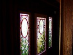 Another set of similar windows in the same room, one that had only recently been added to the tour we took. Unfortunately you couldn't get any closer, would have been nice to get one looking straight on to it. The windows really were very beautiful! Other than that the rooms in the house were generally kind of pokey and all the staircases/hallways were only wide enough for one person at a time. Still, the owner was a towering 4' tall so I suppose that had some bearing on it... !!!!