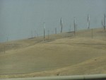 In the area around the town of Tracy there are wind turbines for power generation. Most of them are of the propeller shape but these intrigued us, they are nicknamed egg-beaters and revolve around the central pole. When you see massed wind turbines they really don't look that bad!