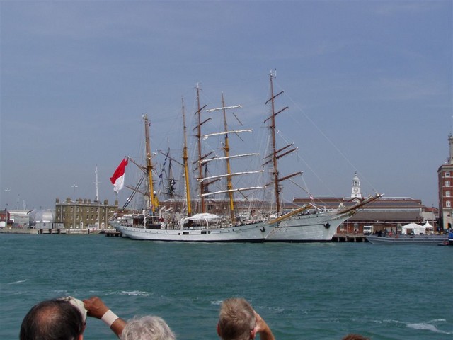 If you look at the larger sized picture there is actually two tall ships here, we think they were also training ships like the other one.  The following week was an International Festival of the Sea so they were probably in port for that.