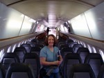 Karen in the cabin of the Concorde - probalby the closest we'll ever get to a trip anywhere in one!  It was surprisingly cramped in there, not like today's first class, more like today's cattle class...