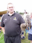 We went to the Joust Festival held at Berkeley Castle, about a half hour drive from where we live.  It was a cracker day and turned out very hot.  Rod got to handle a Falcon, as you can see here.  Thankfully they both behaved themselves...