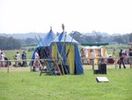 A shot of the weapons tent in the Jousting arena.  Those lances are very long!  And probably quite heavy too...