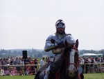 As the name suggests, the event was centred around the medieval combat sport of Jousting, done by knights of the day.  Yes, the one where they charge at each other on horseback with a long wooden stick, hopefully to knock out your opponent and therefore win.  We give these modern-day riders kudos for doing this sport, it was spectacular and memorable to see it in real life!  And they wear authentic gear.  Commendable on a stinking hot day!!