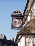 Bampton pub, the Horse Shoe, across the road from...