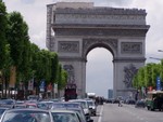 Closer view of the Arc de Triomphe.