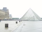 The Louvre Museum photos, along with several that follow this one... This structure is the entrance to the museum.